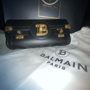 Balmain Elegant Black Clutch with Gold Accents